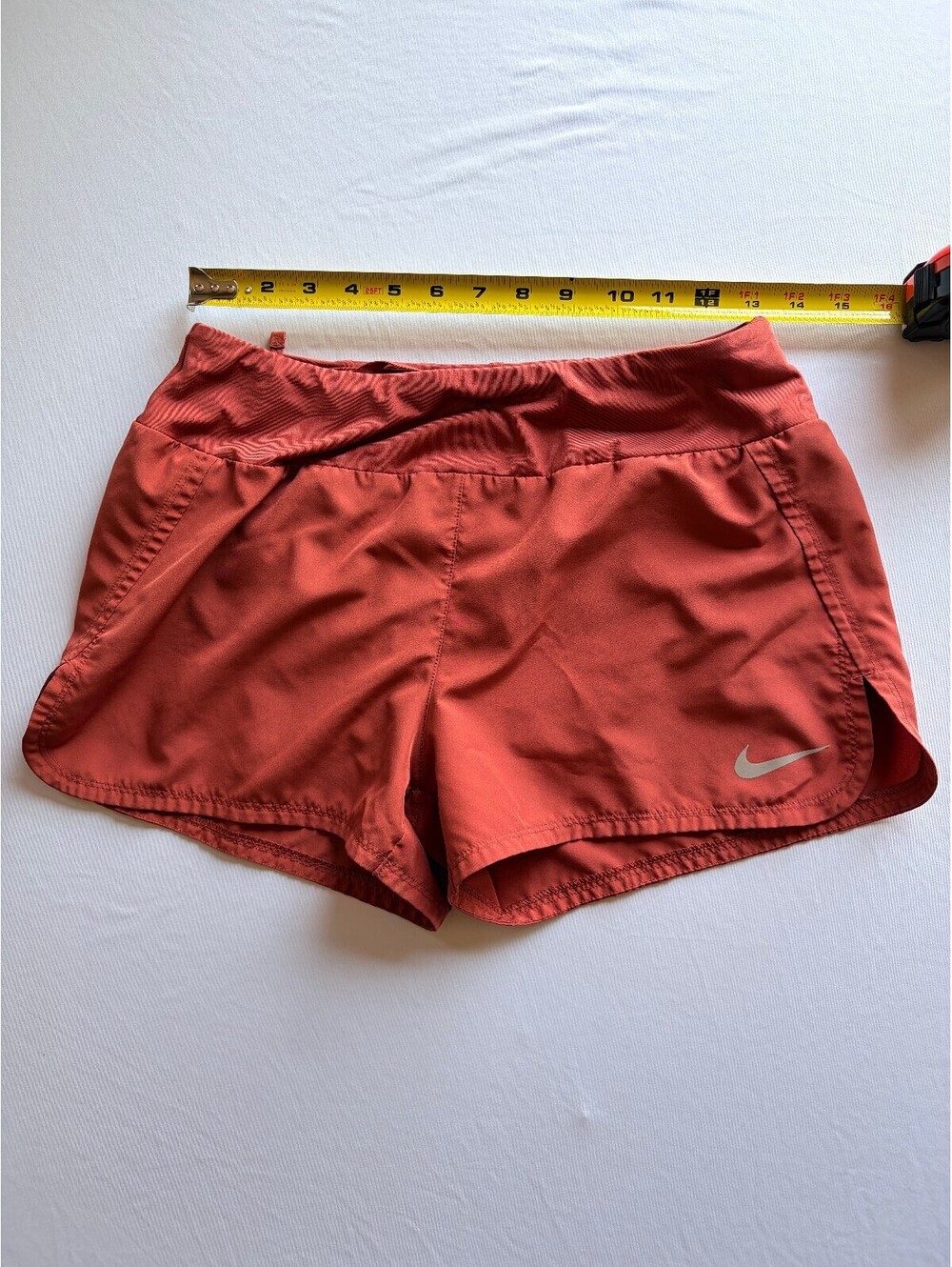 Nike Dri-FIT Women's Medium Coral Pink Tempo Running Shorts Lined Zip Pocket